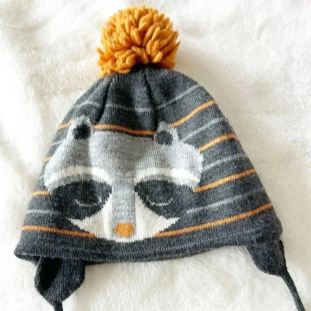Zara baby winter Pom Pom hat with raccoon print size 6-12 months